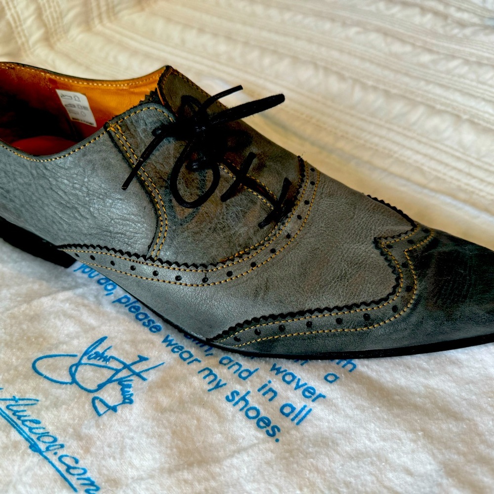 Fluevog Tokyo Nogoya’s in grey and black. All leather, men’s size 12.
